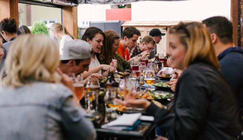 Group of friends at dinner having a conversation